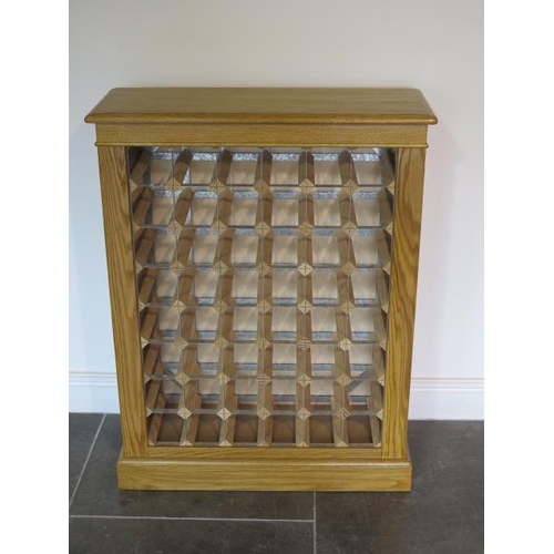 23 - A new oak 48 bottle wine rack, made by a local craftsman to a high standard, 96cm tall x 74cm x 27cm