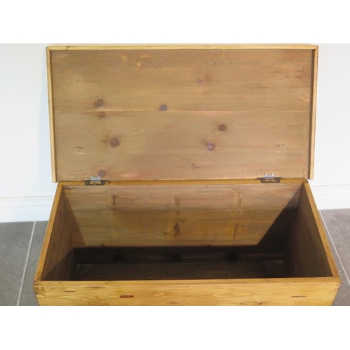 24 - A new pine toy / storage box made by a local craftsman to a high standard, 44cm tall x 85cm x 43cm