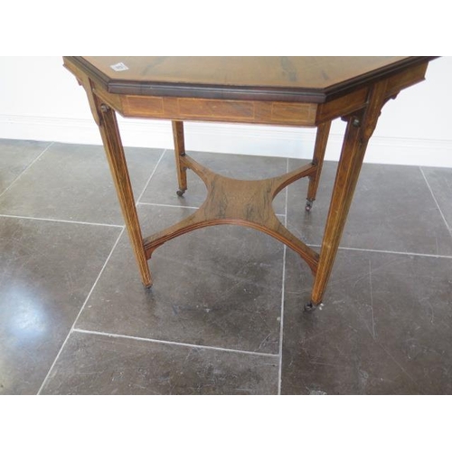 52 - An Edwardian inlaid rosewood octagonal centre table with an undertier, 73cm tall x 82cm, in good con... 