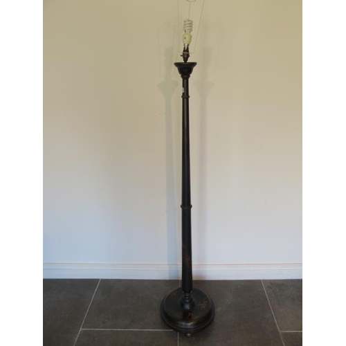60 - A chinoserie decorated black lacquer standard lamp, 153cm tall, will need re-wiring