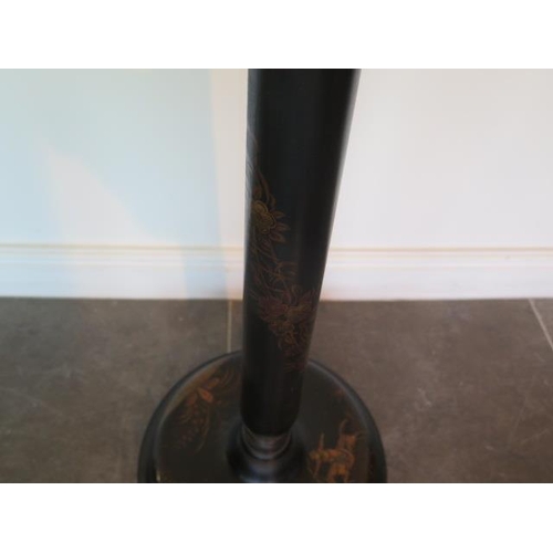 60 - A chinoserie decorated black lacquer standard lamp, 153cm tall, will need re-wiring