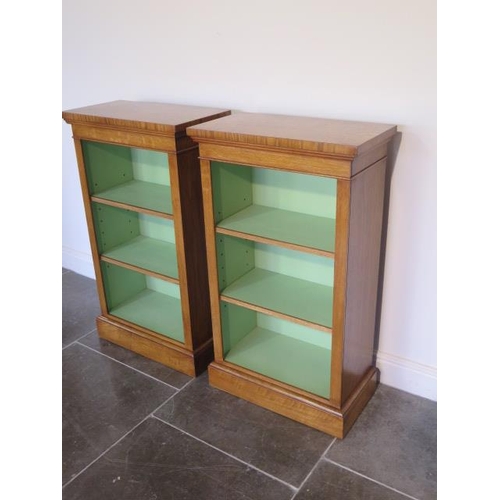 7 - A pair of new burr oak bookcases with adjustable shelves and a painted interior made by a local craf... 