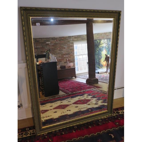 12 - A large gilt framed modern mirror, 137cm x 107cm, in good condition