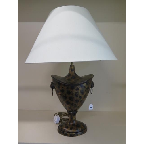 A decorative urn shaped table lamp in working order, 67cm tall, shade 50cm diameter