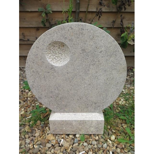 5 - A hand carved abstract garden sculpture, circular design with sparrow pecking detail, 54cm tall x 45... 
