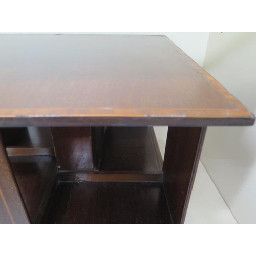 60 - An Edwardian mahogany  inlaid table top revolving bookshelf, 33cm tall x 39cm x 39cm, in generally g... 