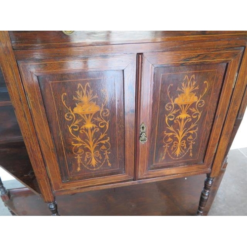 75 - A 19th century rosewood side cabinet with two inlaid doors, 122cm wide x 150cm tall x 38cm deep