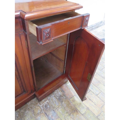 79 - A good quality mahogany breakfront sideboard with two frieze drawers and three cupboard doors enclos... 