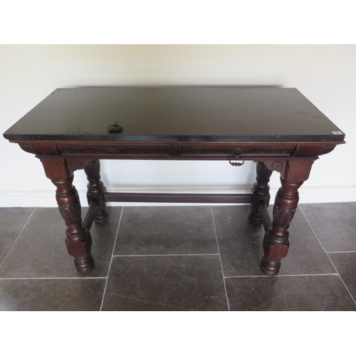 81 - A Victorian black slate top mahogany serving table with two frieze drawers, one stamped Gillows Lanc... 