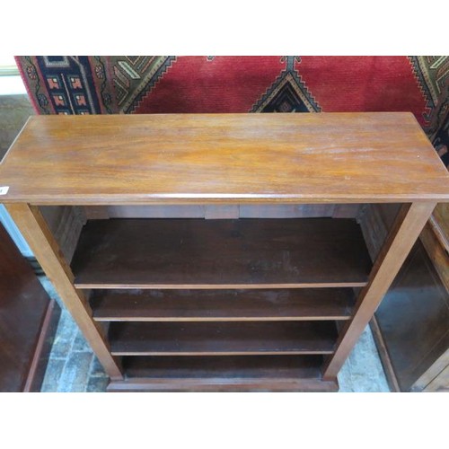 71 - An early 20th century mahogany bookcase with three adjustable shelves, 112cm tall x 92cm x 29cm, in ... 