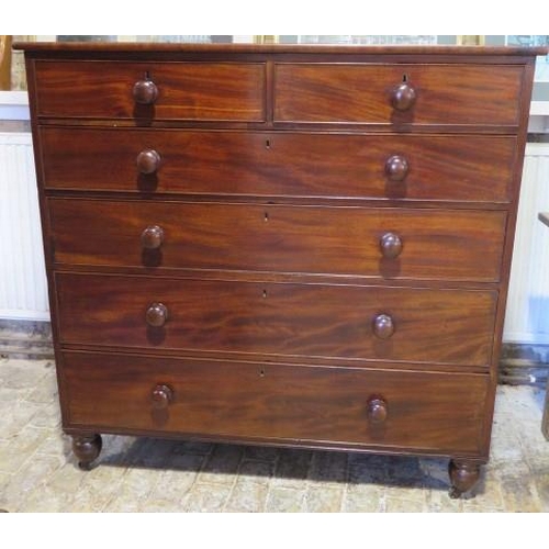53 - An early Victorian mahogany two over four chest of graduated drawers, the drawers with their origina... 