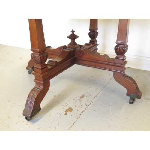 55 - A Victorian mahogany octagonal centre table on square tapering supports and acanthus carved feet, 76... 