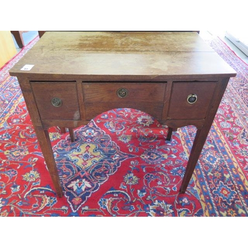 61 - A 19th century oak three drawer side table, 73cm tall x 76cm x 47cm