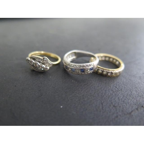 612 - Two 18ct rings and a platinum ring, two set with small diamonds, one stone missing to eternity ring,... 