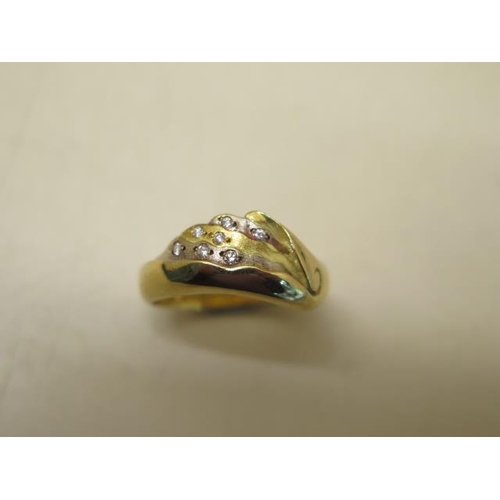 621 - A hallmarked 18ct yellow and white gold ladies dress ring 'seashore', total weight approx 8.4 grams,... 