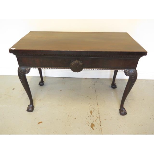 67 - A mahogany serving silver table with carved shaped legs on ball and claw feet with shell carving, 72... 