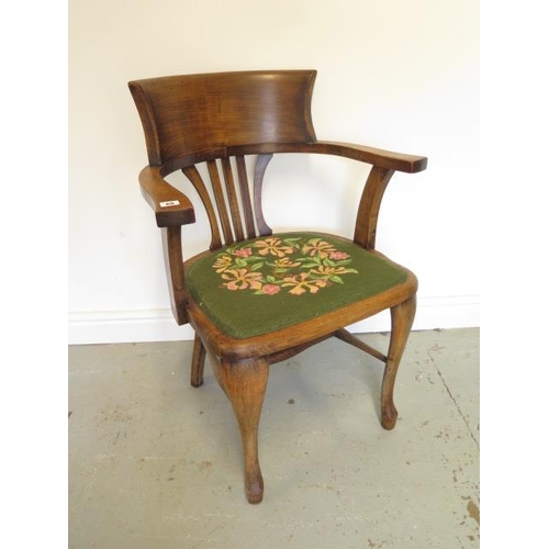 69 - A beechwood desk chair with upholstered seat