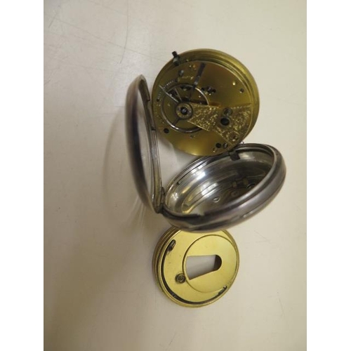 808 - A silver cased pocket watch with a 5cm case, some wear to case and dial, running order, with key