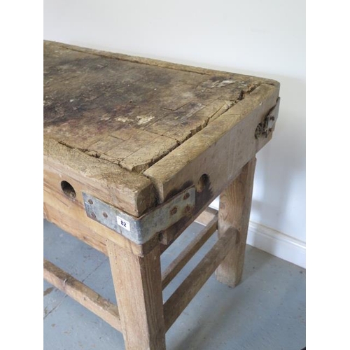 82 - A pine butchers block on stand, 81cm tall x 109cm x 64cm (in barn find condition)