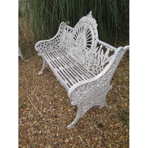 15 - A good cast iron garden bench, 95cm tall x 119cm x 60cm, in painted condition