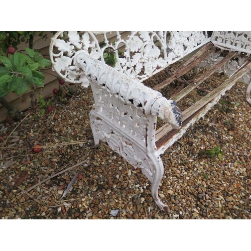 16 - A good cast iron acorn and leaf decorated garden bench with leopard head arms, 95cm tall x 150cm x 6... 