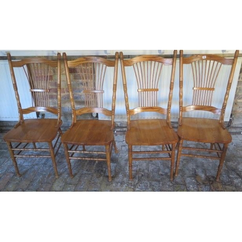19 - A set of four high back American style ash and elm kitchen chairs, 109cm tall
