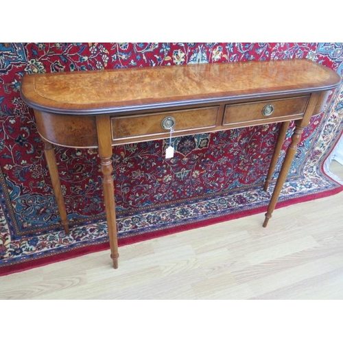 35 - A walnut D shaped two drawer hall table made by a local craftsman to a high standard, 76cm tall x 12... 