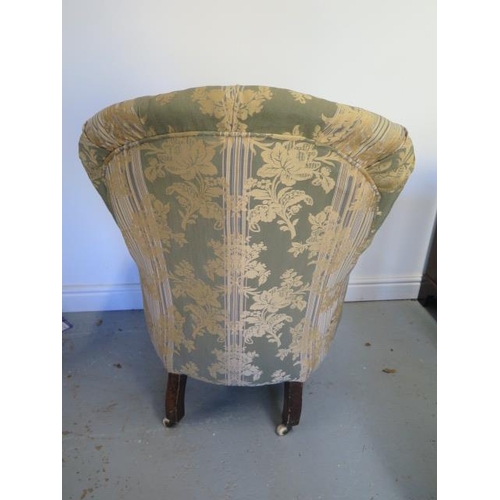 67 - A Victorian button back upholstered fireside chair, 100cm tall x 69cm wide