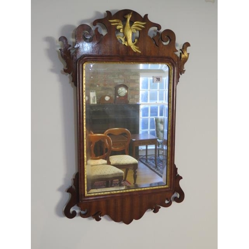 70 - A 19th century bevelled glass mirror with mahogany surround, 69cm x 41cm