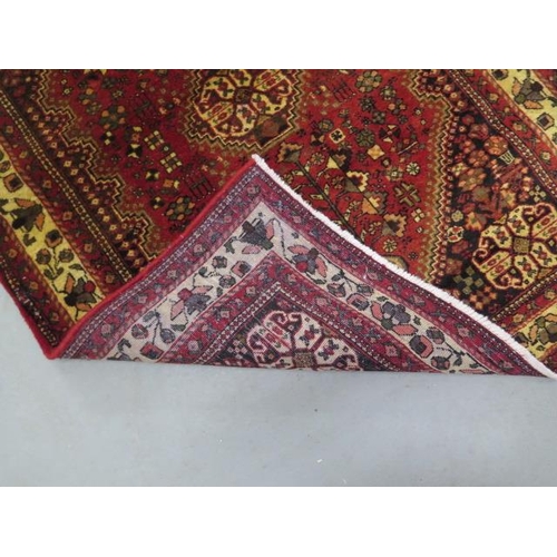 207 - A hand knotted woollen Yallameh rug, 1.45m x 1m