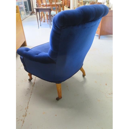 58 - A reupholstered Victorian button back armchair, 95cm tall x 82cm wide, in good condition