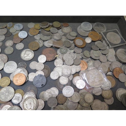 870 - A collection of assorted World coins and banknotes and money boxes