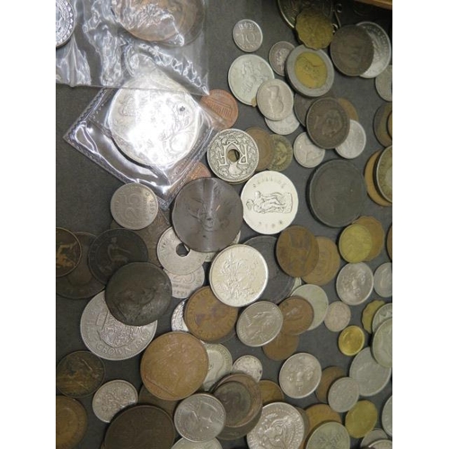 870 - A collection of assorted World coins and banknotes and money boxes