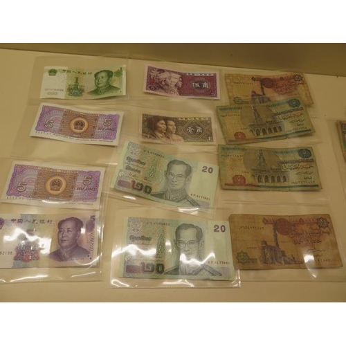 875 - A large collection of World bank notes