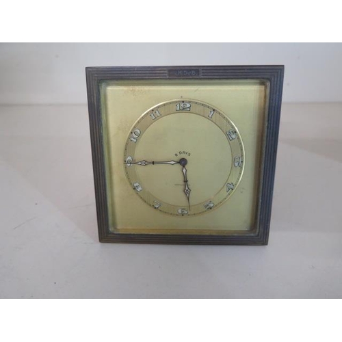 151 - A Tiffany & Co 8 day easel back desk clock, 12cm x 12cm, engraved C.M.Dub, hands advance, in working... 