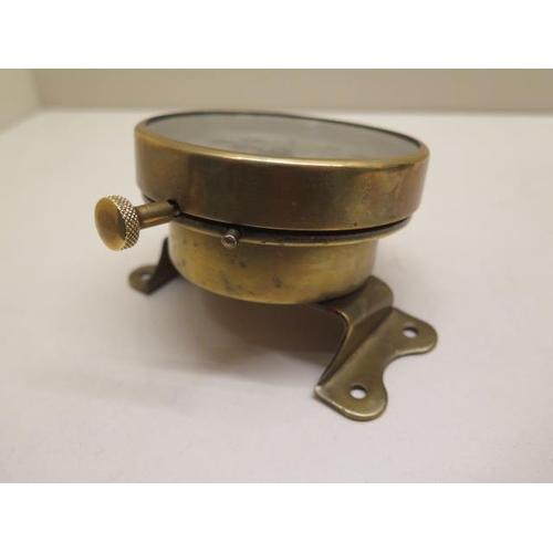154 - Watford: An early car clock of brass construction with footboard angled mount, the 9cm diameter silv... 