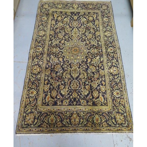 207 - A hand knotted woollen Kashan rug, 2.20m x 1.32m