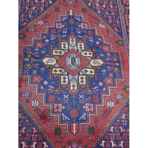 211 - A hand knotted woollen Hamadam rug, 2.00m x 1.20m