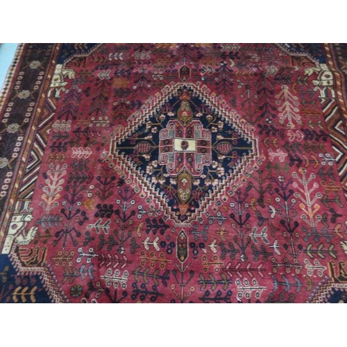 215 - A hand knotted woollen Qashqai rug, 2.65m x 1.70m