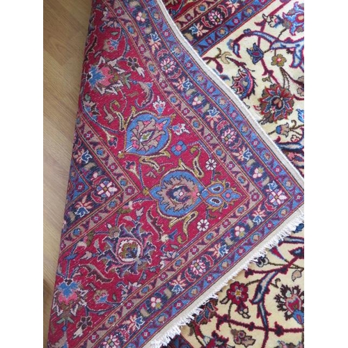 220 - A hand knotted woollen Meshed rug, 3.45m x 2.55m