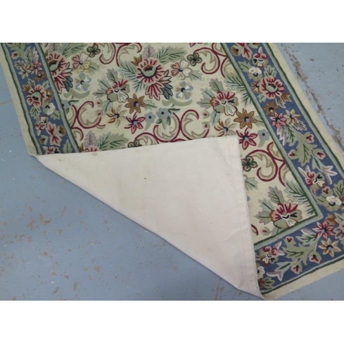 222 - A Kashmiri hand stitched wool chain rug, 147cm x 90cm
