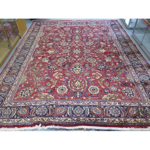 223 - A hand knotted woollen Meshed rug, 3.74m x 2.90m
