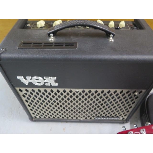 292 - A Brian May electric guitar BHM08287 and a Vox VT15 Valvetronix amplifier with leads, in working ord... 