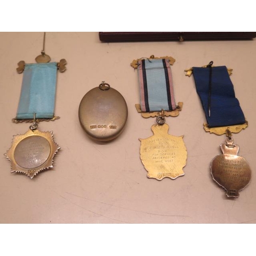 312 - Four silver Buffalo medals, one boxed with certificate, and one masonic silver jewel, total weight a... 