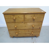 A Victorian stripped pine waxed four drawer chest, 83cm tall x 91cm x 45cm