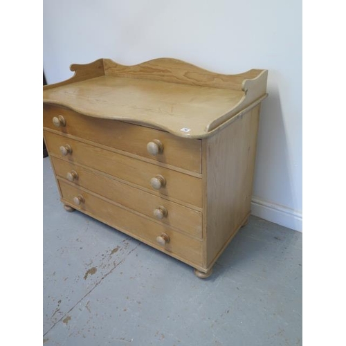 70 - A good Victorian stripped pine four drawer chest with a shaped galleried top, 87cm tall x 110cm x 59... 