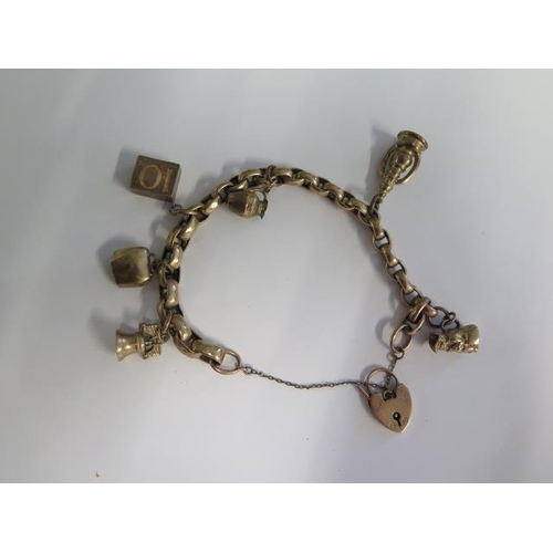 A 9ct gold charm bracelet, approx 28.7 grams