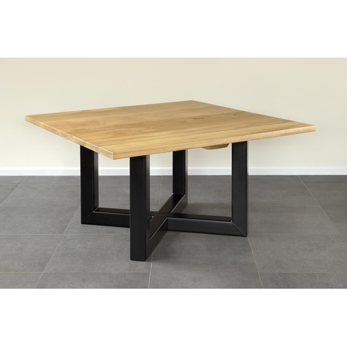 21 - A new good quality solid oak and steel dining table, 76cm tall x 141cm x 140cm RRP £885