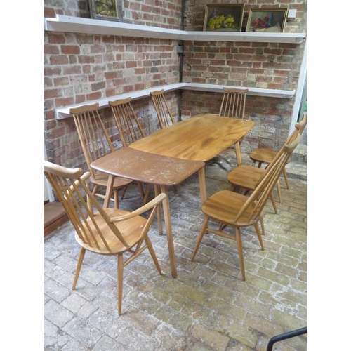 1 - A blonde elm Ercol dining table, 71cm tall x 152cm x 75cm with separate extension which extends it t... 