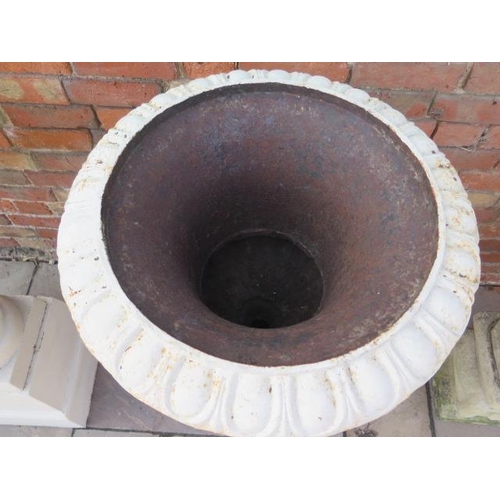 15 - A pair of cast iron garden urns on stands, 111cm tall x 57cm diameter